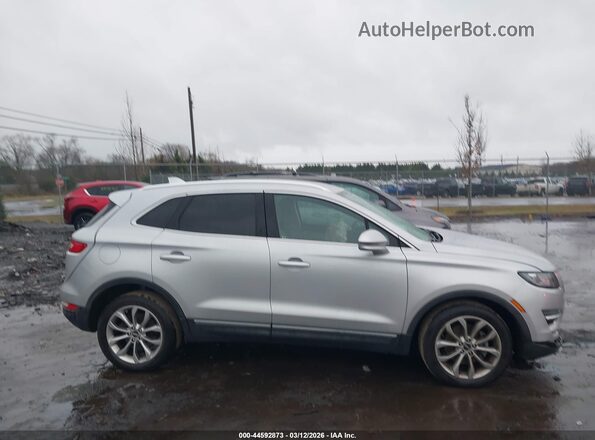5LMCJ2C95KUL08186 2019 LINCOLN MKC Серебряный Вид задней части салона