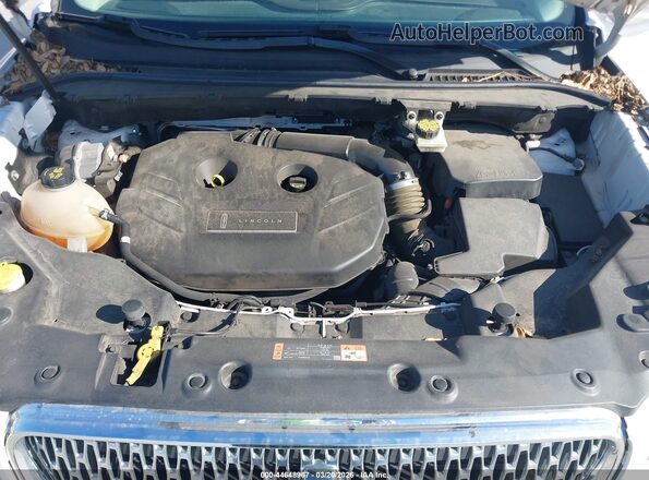 5LMCJ2C95KUL09208 2019 LINCOLN MKC White Rear view
