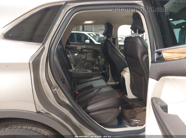5LMCJ2C97GUJ26920 2016 LINCOLN MKC Gold Widok naklejki z numerem VIN