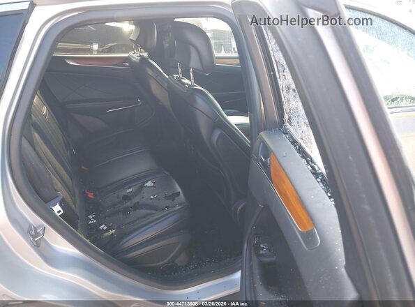 5LMCJ2D92KUL44299 2019 LINCOLN MKC Серебряный Вид наклейки с VIN-кодом