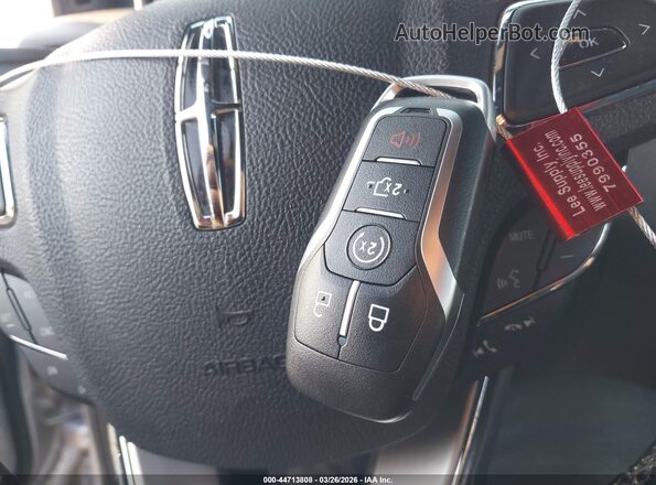 5LMCJ2D92KUL44299 2019 LINCOLN MKC Серебряный Вид панели приборов