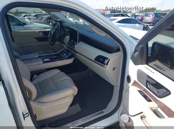 5LMJJ2LT4MEL20880 2021 LINCOLN NAVIGATOR Белый Вид салона спереди