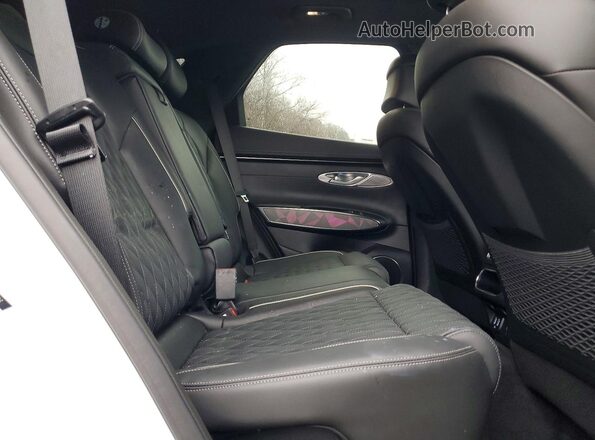 5NMMCDTC3RH016583 2024 GENESIS GV70 White Vista interior trasera