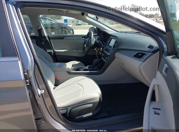 5NPE24AF9KH769581 2019 HYUNDAI SONATA Silver Widok wnętrza z przodu