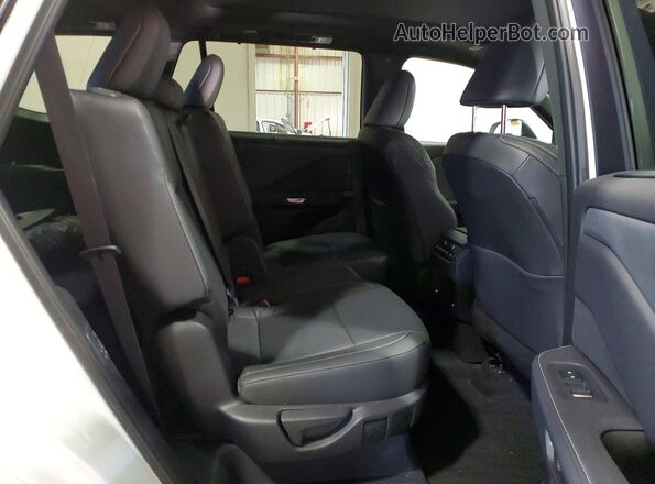 5TDAAAB6XSS035962 2025 LEXUS TX White Widok wnętrza z tyłu