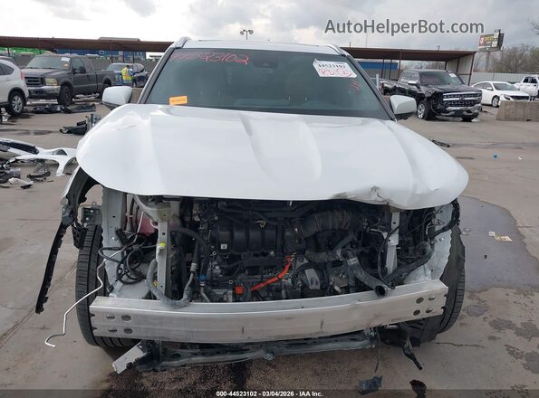 5TDFARAH2PS020676 2023 TOYOTA HIGHLANDER HYBRID White Rear interior view