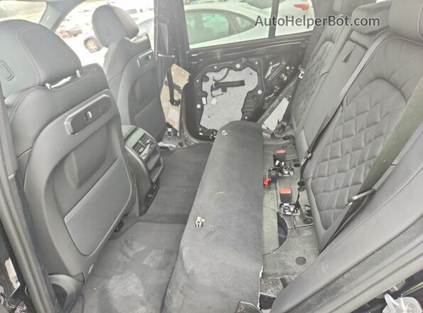 5UX13EU09T9325781 2026 BMW X5 Black Widok wnętrza z tyłu