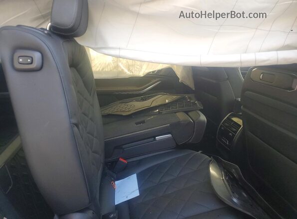 5UX23EM04T9202653 2026 BMW X7 Gray Widok tylnych siedzeń