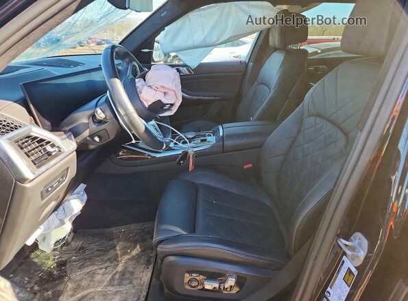 5UX23EM05S9X84485 2025 BMW X7 Blue Widok wnętrza z przodu