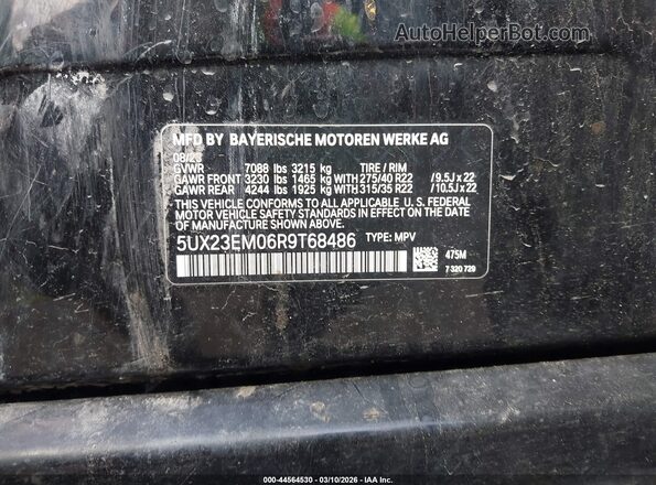 5UX23EM06R9T68486 2024 BMW X7 Black Vista del compartimento del motor