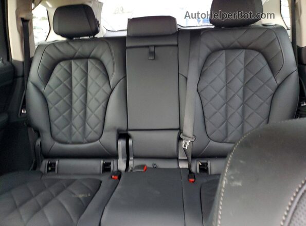 5UX23EM07S9Z37299 2025 BMW X7 Black Vista de los asientos traseros