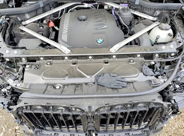 5UX23EM07S9Z37299 2025 BMW X7 Black Vista del compartimento del motor