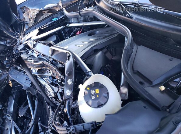 5UX23EU04T9028910 2026 BMW X5 Black Engine compartment view