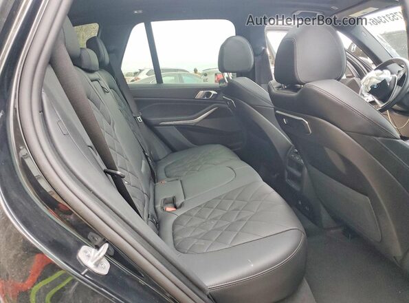 5UX23EU05T9048583 2026 BMW X5 Gray Vista de los asientos traseros