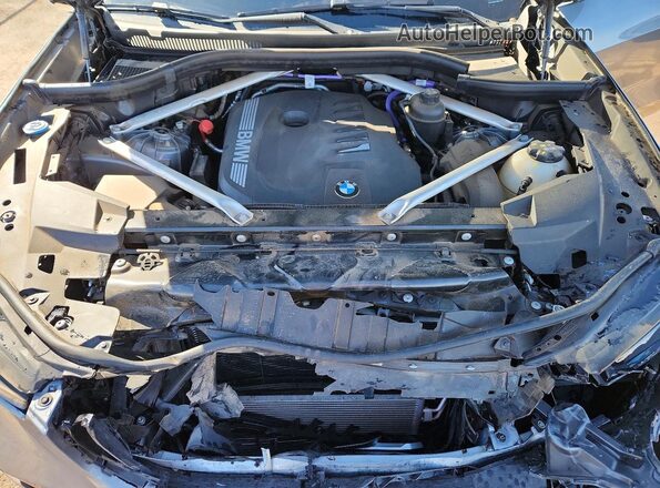 5UX23EU07R9S14286 2024 BMW X5 Silver Widok wnętrza z tyłu