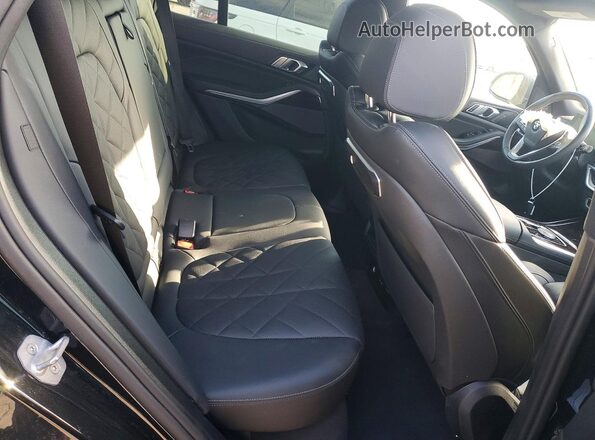 5UX23EU0XT9048532 2026 BMW X5 Черный Вид задней части салона