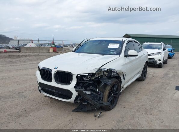 5UX2V1C06M9F26017 2021 BMW X4 White წინა მარცხენა ხედი სამი მეოთხედიდან