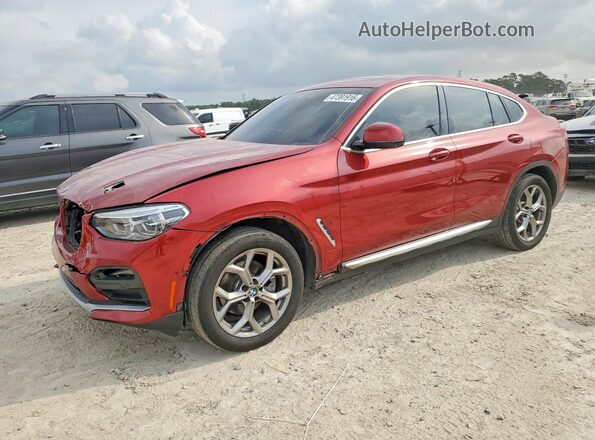 5UX2V1C06M9G94367 2021 BMW X4 Red Առջևի ձախ երեք քառորդ տեսարան