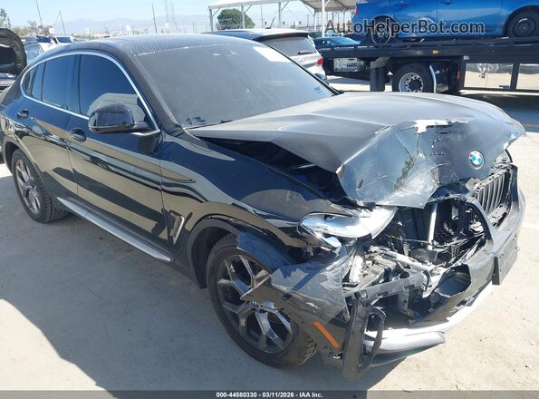 5UX2V1C08M9F13754 2021 BMW X4 Черный Передняя правая четверть