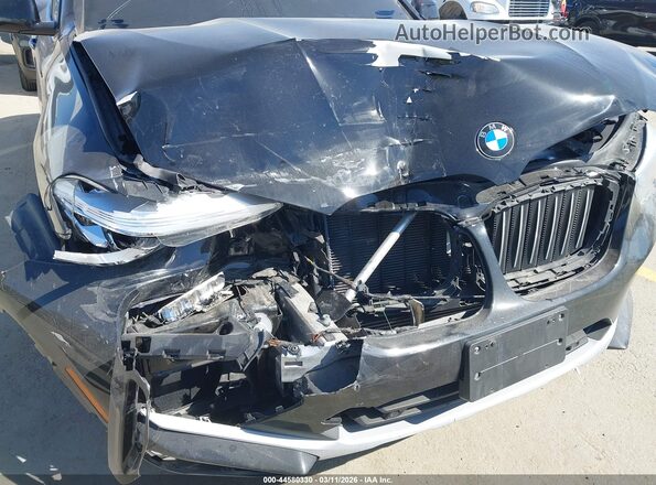 5UX2V1C08M9F13754 2021 BMW X4 Черный Вид спереди