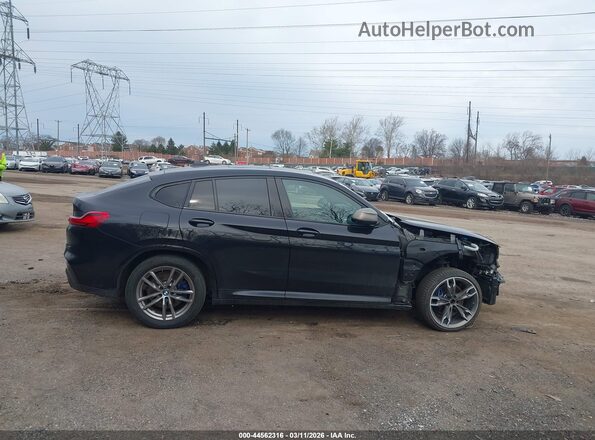 5UX2V5C01LLE69685 2020 BMW X4 Black Widok wnętrza z tyłu