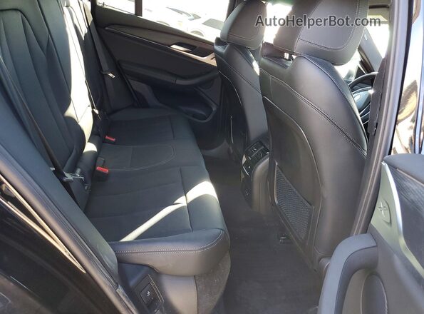 5UX33DT01P9P09757 2023 BMW X4 Black Widok wnętrza z tyłu