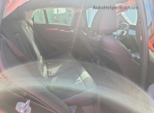 5UX33DT01P9T04692 2023 BMW X4 Black Вид задньої частини салону