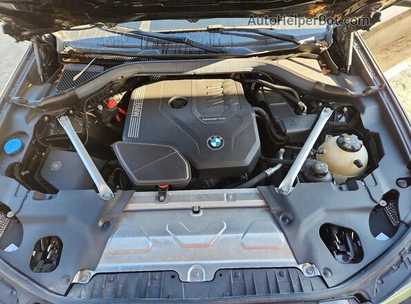 5UX33DT01P9T04692 2023 BMW X4 Black Вид підкапотного простору