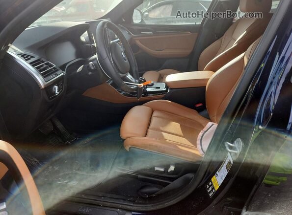 5UX33DT05P9R00825 2023 BMW X4 Синий Вид салона спереди