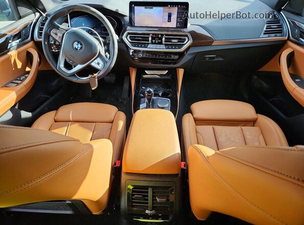 5UX33DT05P9R00825 2023 BMW X4 Синий Вид панели приборов