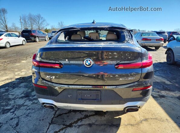 5UX33DT07R9V93371 2024 BMW X4 Black Vista trasera