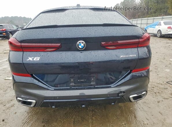5UX33EX03S9Z08155 2025 BMW X6 Blue Vista trasera