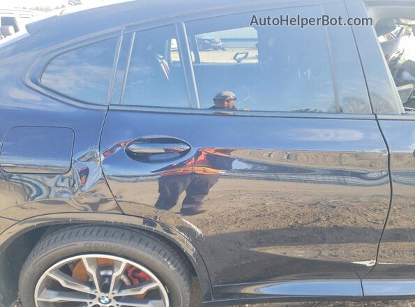 5UX43DT00R9X37850 2024 BMW X4 Черный Вид задней части салона