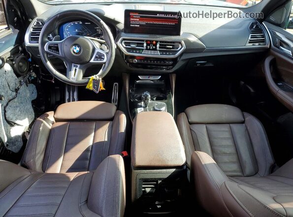 5UX43DT04P9N89876 2023 BMW X4 Синий Вид панели приборов