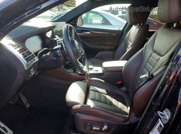 5UX43DT04P9N89876 2023 BMW X4 Синий Вид салона спереди