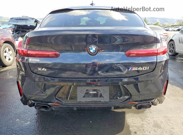 5UX43DT04P9N89876 2023 BMW X4 Синий Вид сзади
