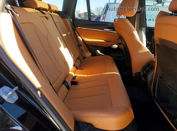 5UX53DP09N9N04980 2022 BMW X3 Black Vista interior trasera
