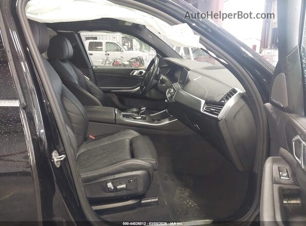5UXCR6C00P9P10702 2023 BMW X5 Черный Вид салона спереди