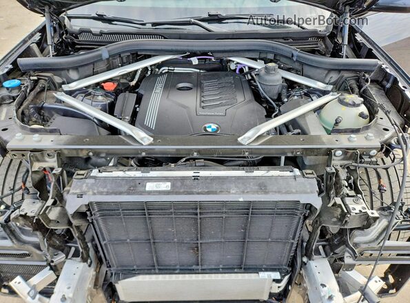 5UXCR6C0XM9D80260 2021 BMW X5 Gray Vista interior trasera