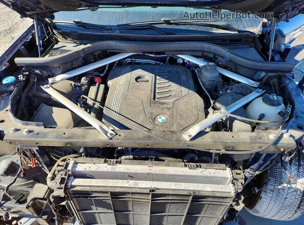 5UXCW2C09M9G89221 2021 BMW X7 Purple Սալոնի հետևի տեսք