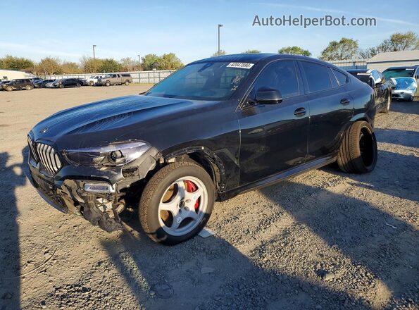 5UXCY6C09P9N63590 2023 BMW X6 Черный Передняя левая четверть