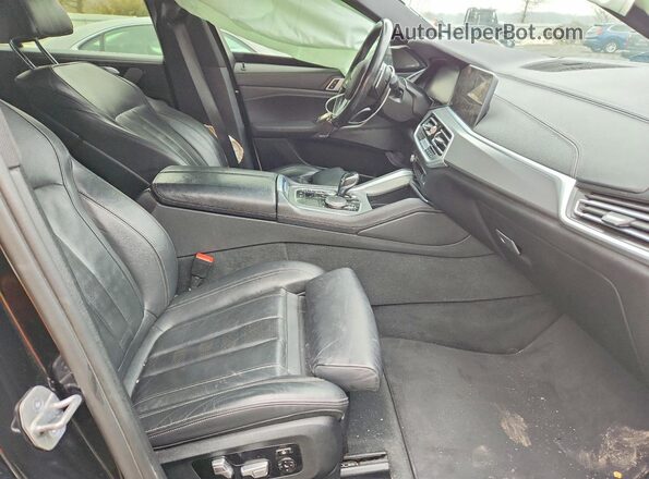 5UXCY6C0XL9C72500 2020 BMW X6 Черный Вид салона спереди