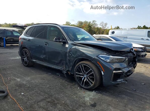 5UXJU4C00P9R60676 2023 BMW X5 Серый Передняя правая четверть