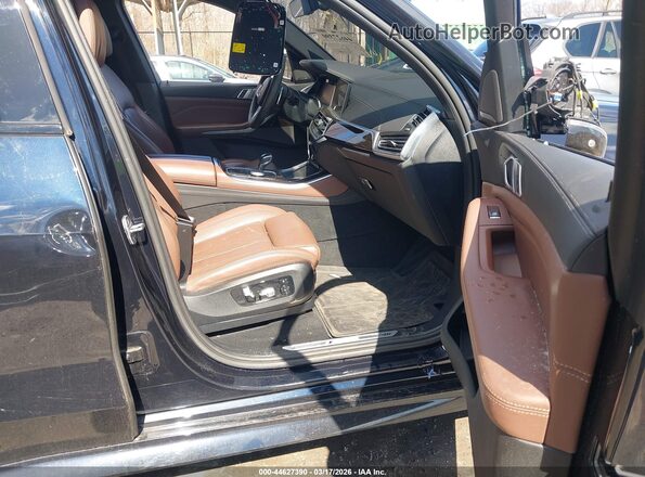 5UXJU4C03L9B72472 2020 BMW X5 Синий Вид салона спереди