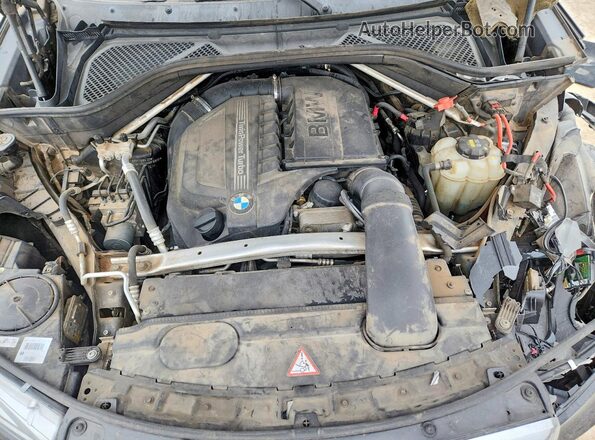 5UXKU0C50G0F93035 2016 BMW X6 Черный Вид задней части салона