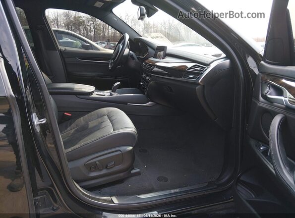 5UXKU2C54J0X49299 2018 BMW X6 Черный Вид салона спереди