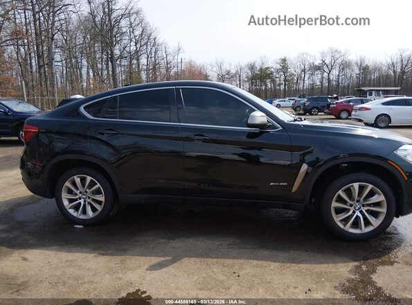 5UXKU2C54J0X49299 2018 BMW X6 Черный Вид задней части салона