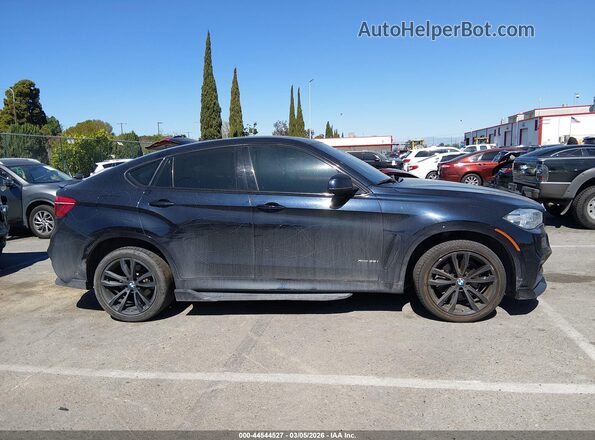 5UXKU2C58G0N79280 2016 BMW X6 Черный Вид задней части салона