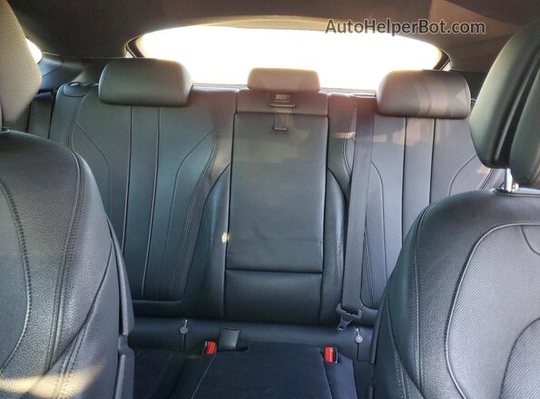 5UXKU6C59G0R34108 2016 BMW X6 Черный Вид задней части салона