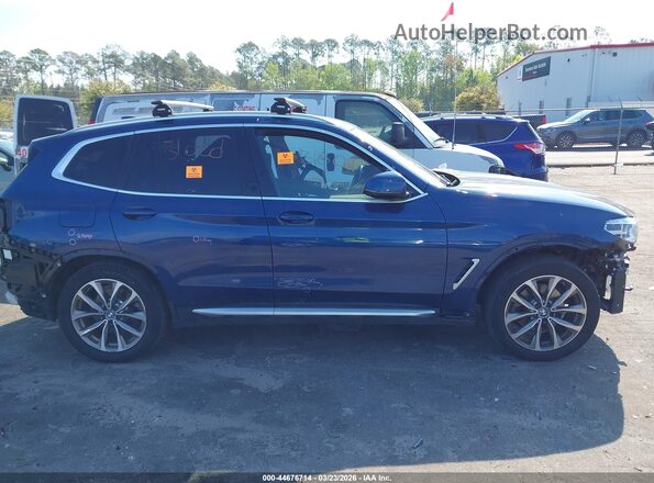 5UXTR9C51KLE14132 2019 BMW X3 Синий Вид задней части салона